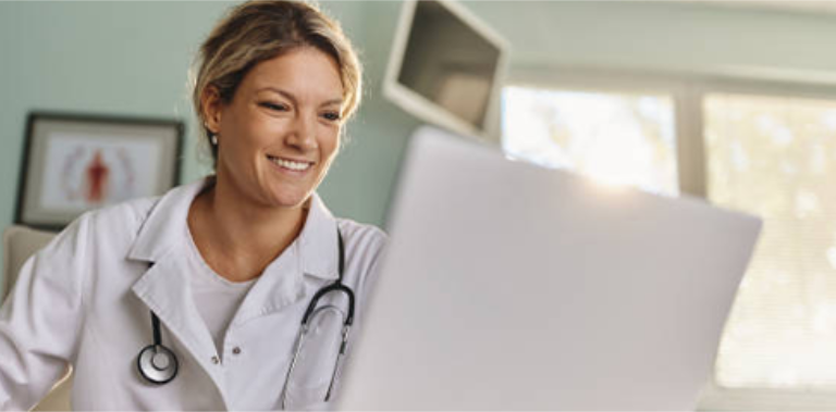 Doctor using a laptop