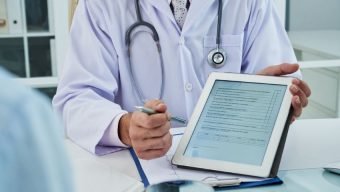 Doctor holding a digital tablet